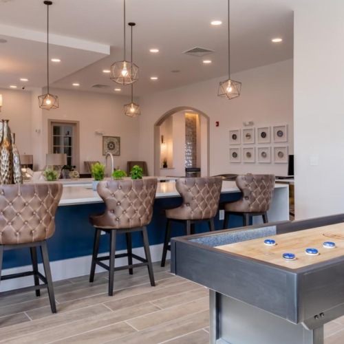 a room with a table and chairs