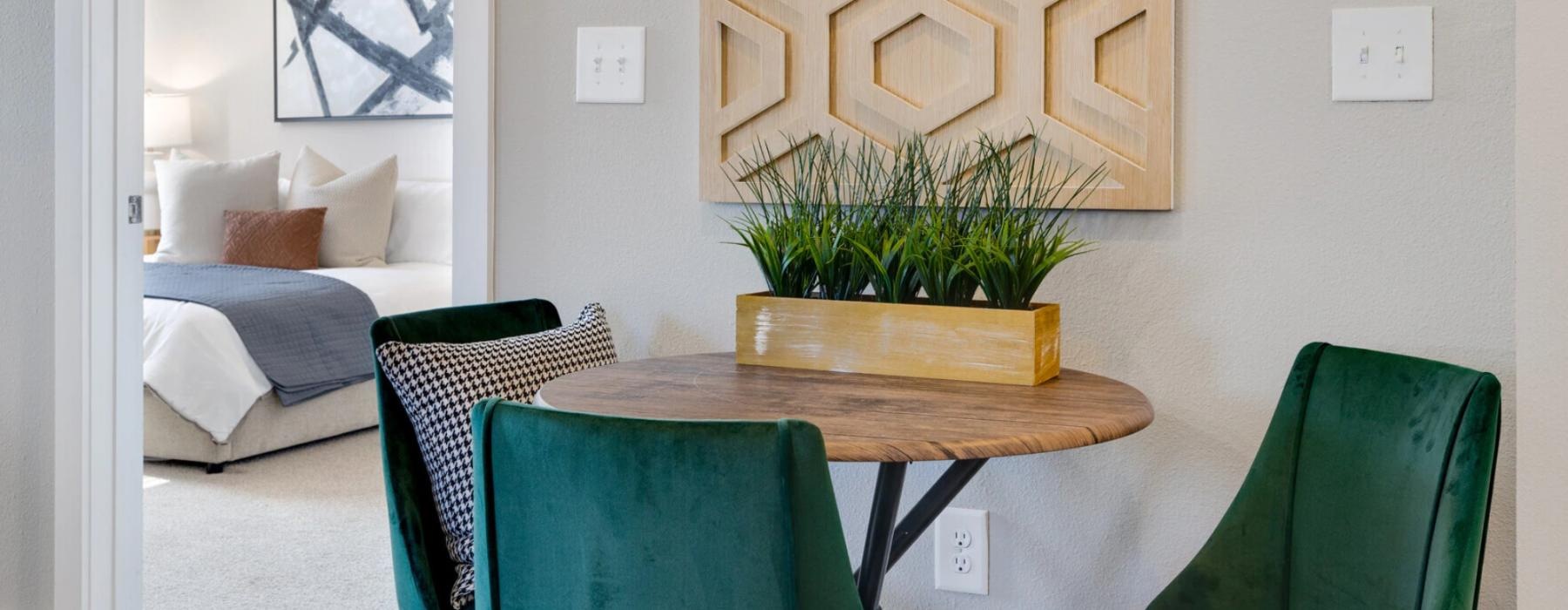 a room with a table and chairs